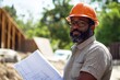 © Larisa - Confident architect with blueprint at construction site