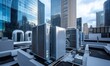 © Vitalii - Rooftop HVAC unit on a modern building surrounded by glass skyscrapers and a paved surface area