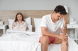 © Pixel-Shot - Upset young man sitting in bedroom. Sexual problems concept