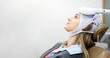 ©  Yistocking - A Caucasian girl between 20 and 30 years old undergoes transcranial magnetic stimulation therapy at a psychiatric center to treat depression or anxiety.Copyspace for EMT advertising.