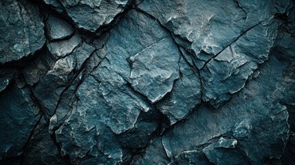 Wall Mural - Textured dark rock surface with cracks and layers.