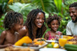 © pipop - Family Happiness Tips. A joyful family enjoys a meal together outdoors, surrounded by lush greenery, showcasing love, laughter, and delicious food.