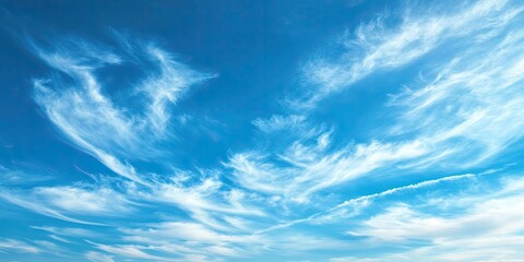 Poster - Background featuring a blue sky and white cirrus clouds.