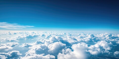 Poster - Blue sky with a soft cloud texture set against a wide, bright blue sky backdrop and space.