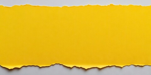 Leinwandbilder - Close-up view of a yellow sheet of paper on a gray background.