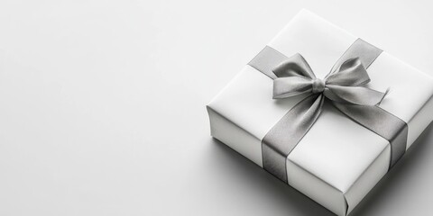 Poster - close-up of a white box with a gift, isolated on white.