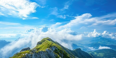 Poster - Summer view from mountain summit looking at the blue sky with clouds below.
