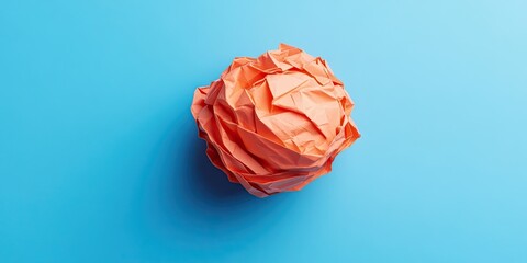 Aufkleber - Crumpled paper ball on a colored background.