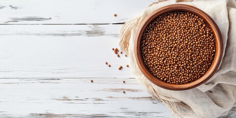 Aufkleber - Brown bowl of delicious buckwheat porridge on a white wooden table. Top view with copyspace.