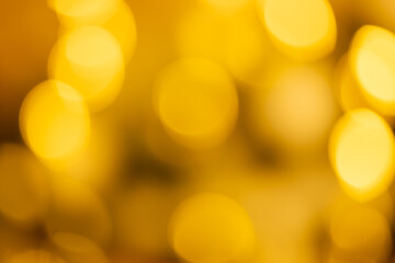 Wall Mural - a blurry yellow background with many small circles