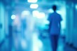 © SY - Blurry hospital hallway scene. Perfect for depicting themes of healthcare, anonymity, or uncertainty.