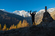 © AleMasche72 - Hobbies and outdoor recreation. Silhouette of a man on a treasure hunt with a recreational metal detector in mountain. Electronic treasure finder. Macugnaga and Monte Rosa, Italy