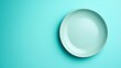 © Galib - A light blue plate on a light blue background.