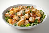 Delicious Caesar salad featuring grilled chicken, croutons, and creamy dressing in a bright bowl.