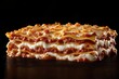 © Espresso - Delicious lasagna with layers of cheese, sauce, and pasta, perfectly baked and golden brown.