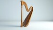 © Borasca - Elegant wooden harp in minimalist setting with soft lighting