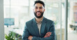 © peopleimages.com - Arms crossed, portrait and smile of business man in office for corporate career development. Confident, face and pride with happy Indian employee person in workplace for start of company internship