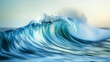 © PPS - A large, powerful wave breaks in the ocean, creating a dramatic display of water and foam. The wave is backlit by the sun, casting a warm glow on the water.