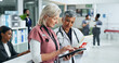 © peopleimages.com - Doctor, nurse and women with tablet for advice, hospital management and consulting together. Healthcare, professional and medical team with digital app for online schedule, agenda or report in clinic