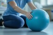 © CreativeLight - A woman engaging in a fitness routine using a fitball, promoting physical health and core strength through dynamic exercises