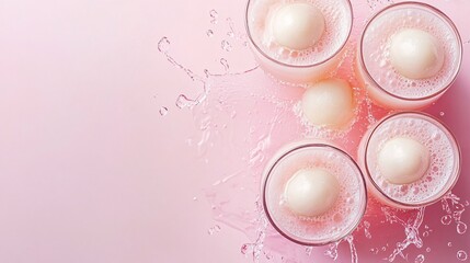 Fototapete - 45-degree topview Isolated on background a creamy lychee soda with pale pink juice layered beneath fizzy soda topped with lychee fruit splashing delicately on a soft pastel background with side empty