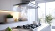 © Puttipong - Modern Kitchen with Ventilation Hood and Gas Stove Producing Steam, Showcasing Contemporary Design and Culinary Atmosphere in Bright Space