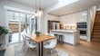© altitudevisual - Modern kitchen and dining area with large windows showcasing a winter landscape. Features include a wooden dining table with white chairs, pendant lighting, and a kitchen island with stools.