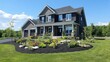 © Ari - Taking a final look at the brand new house, fresh landscaping, sunny sky,
