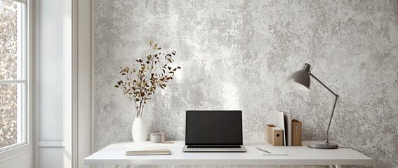 Wall Mural - A workstation with a laptop, and desk lamp on a white table in a minimalist interior with a patterned wallpaper wall