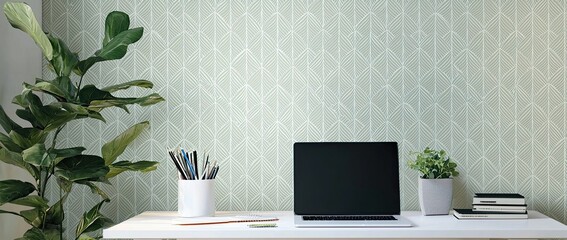 Wall Mural - Minimalist modern home office desk with a laptop, and stationery on a white table against a wall with patterned wallpaper