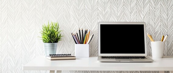 Wall Mural - Minimalist modern home office desk with a laptop, and stationery on a white table against a wall with patterned wallpaper