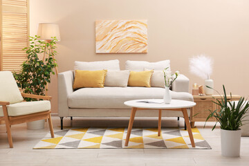 Aufkleber - Stylish living room interior with comfortable sofa near beige wall