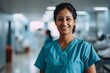 © NikoG - Smiling portrait of a middle aged female Indian nurse in hospital