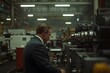 © photo for everything - Impeccably Suited Executive Monitoring Factory Operations – Corporate Leadership, Industrial Oversight, and Professional Business Environment