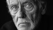 © Snezhana - Thoughtful Black and White Close-Up Portrait of Elderly Man with Deep Expression