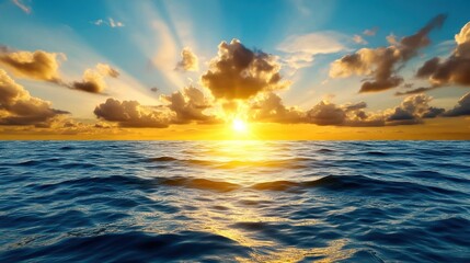 Wall Mural - Stunning sunset over the ocean, vibrant colors lighting up the sky and water.