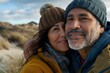 © Markus Schröder - Portrait of a glad latino couple in their 40s donning a warm wool beanie while standing against serene dune landscape background