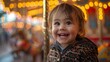 © kiatipol - Overjoyed Child s Radiant Expression on Carousel Ride at Vibrant Amusement Park