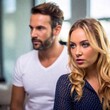 © LIGHTFIELD STUDIOS - attractive man and blonde woman who are angry with each other