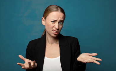 Wall Mural - looking puzzled, confused and stressed, wondering between different options, feeling uncertain