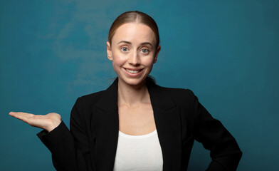 Wall Mural - smiling, feeling confident, successful and happy, showing concept or idea on copy space on the side