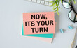 © Pawel - Keyboard, notebook, pen and glasses on blue background , text NOW ITS YOUR TURN.