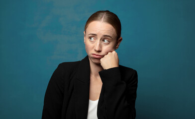Wall Mural - feeling sad and stressed, upset because of a bad surprise, with a negative, anxious look
