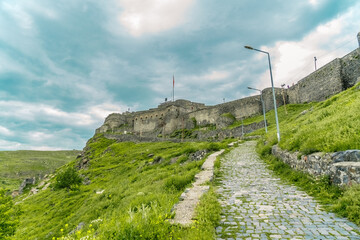 Wall Mural - View of the stony road leading to Kars Castle.