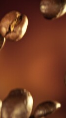 Aufkleber - Super Slow Motion of Falling Coffee Beans on Pile. Concept of Roasting Coffee Beans. Filmed on High Speed Cinema Camera, 1000 fps.
