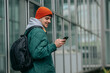© carballo - student with backpack and mobile phone