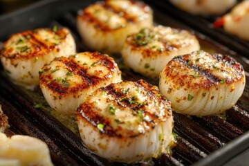 Canvas Print - Deliciously grilled scallops glistening with herbs, showcasing a perfect sear and inviting texture.