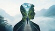 © Thitiporn - The Path Within: A double exposure image of a man walking a path, symbolizing inner journey and self-discovery, set against a dramatic mountain landscape.