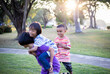 © chaunpis - group of cute asian kids having fun in the park