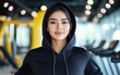 © FreyStudios - Confident Woman in a Gym Hoodie - A Portrait of Fitness and Style